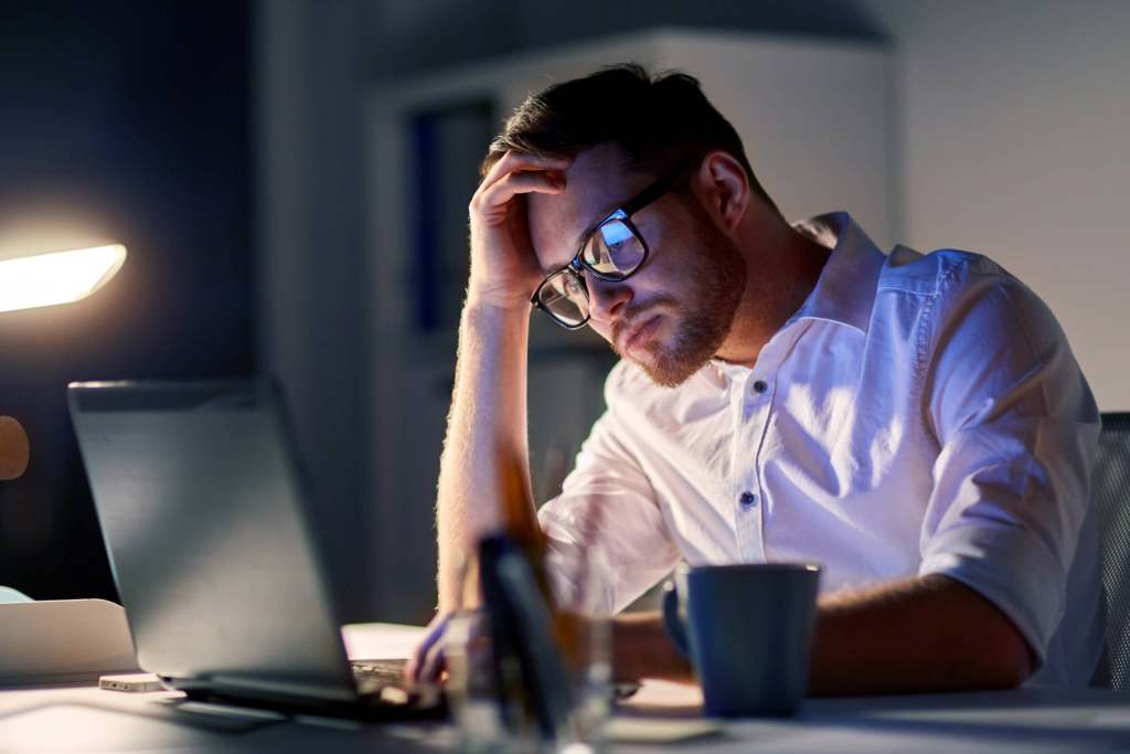 Business,,overwork,,people,,deadline,and,technology,concept, ,stressed,businessman