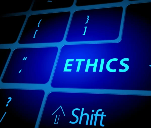 A computer keyboard with a blue key labeled "ethics" sits next to standard keys—including shift—symbolizing ai ethics as a practical guide for smes navigating responsible technology use.