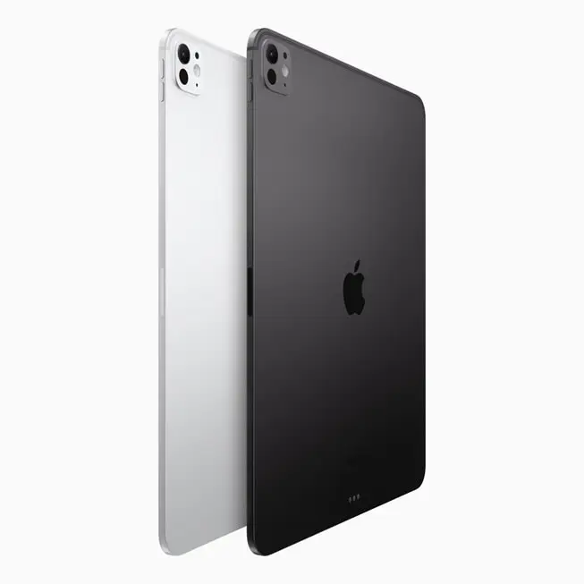Two Apple iPad Pro tablets shown from the back, one in silver and one in space grey, featuring dual rear cameras and the Apple logo, set against a plain white background—perfect for fans following Apple announcements.