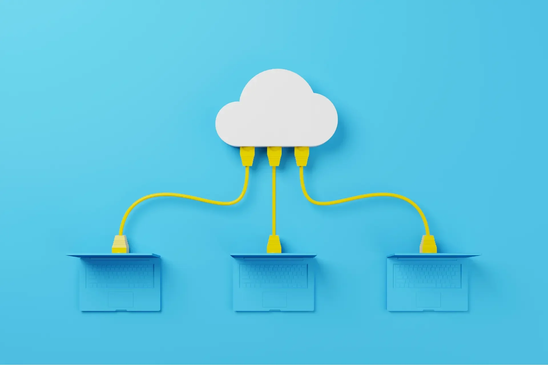 A white cloud icon is connected by yellow cables to three blue laptop icons on a blue background, illustrating cloud computing and scalable identity management.
