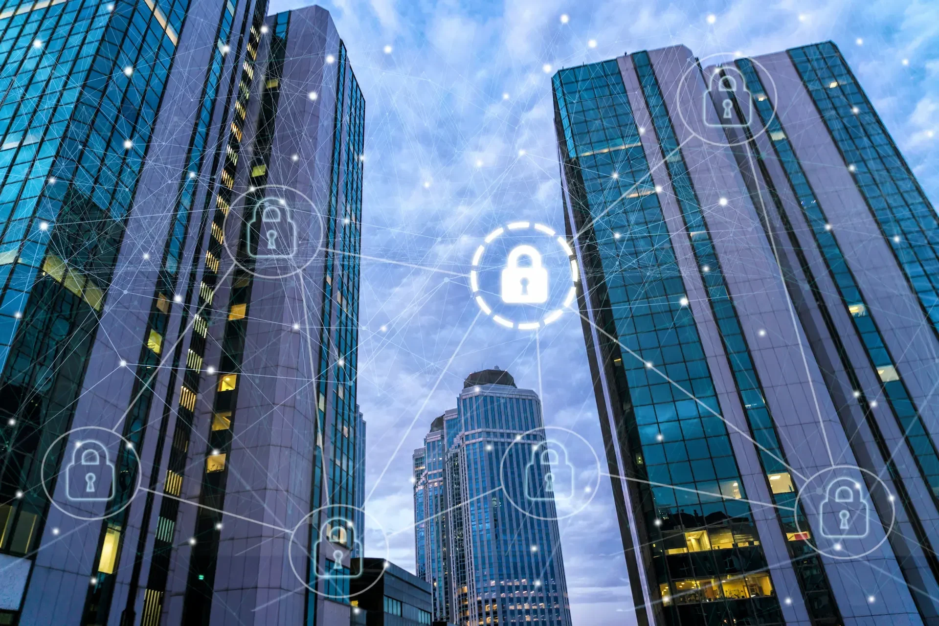 Tall office buildings with digital padlock icons and connecting lines overlayed, representing mandatory cyberattack reporting and data protection in a modern city environment.