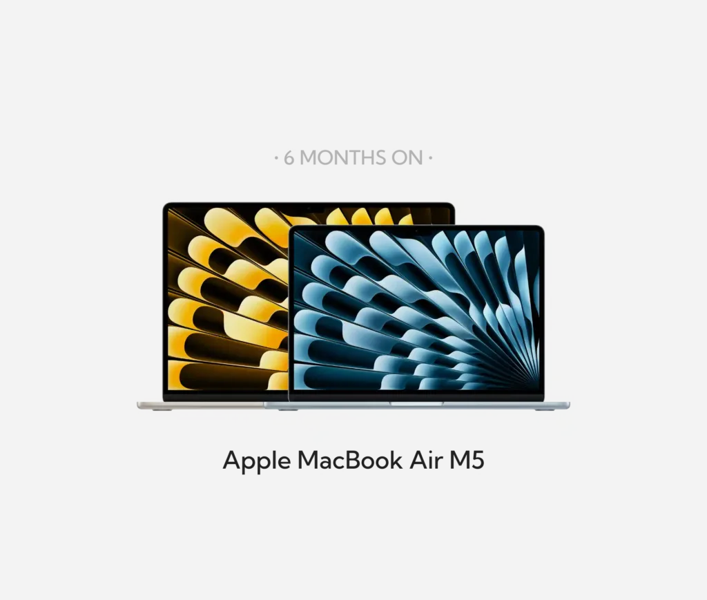 Two Apple MacBook Air M5 laptops are side by side, one with a yellow wallpaper and the other with a blue wallpaper. Above them, text reads “6 MONTHS ON,” offering an honest answer to how the MacBook Air M5 performs in real world use. Below, text says “Apple MacBook Air M5,” making this six months review both visually clear and insightful.