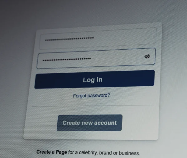 A login screen for the Denmark population register with fields for email and a weak password, featuring a Log In button, a Forgotten password link, and a Create new account button.